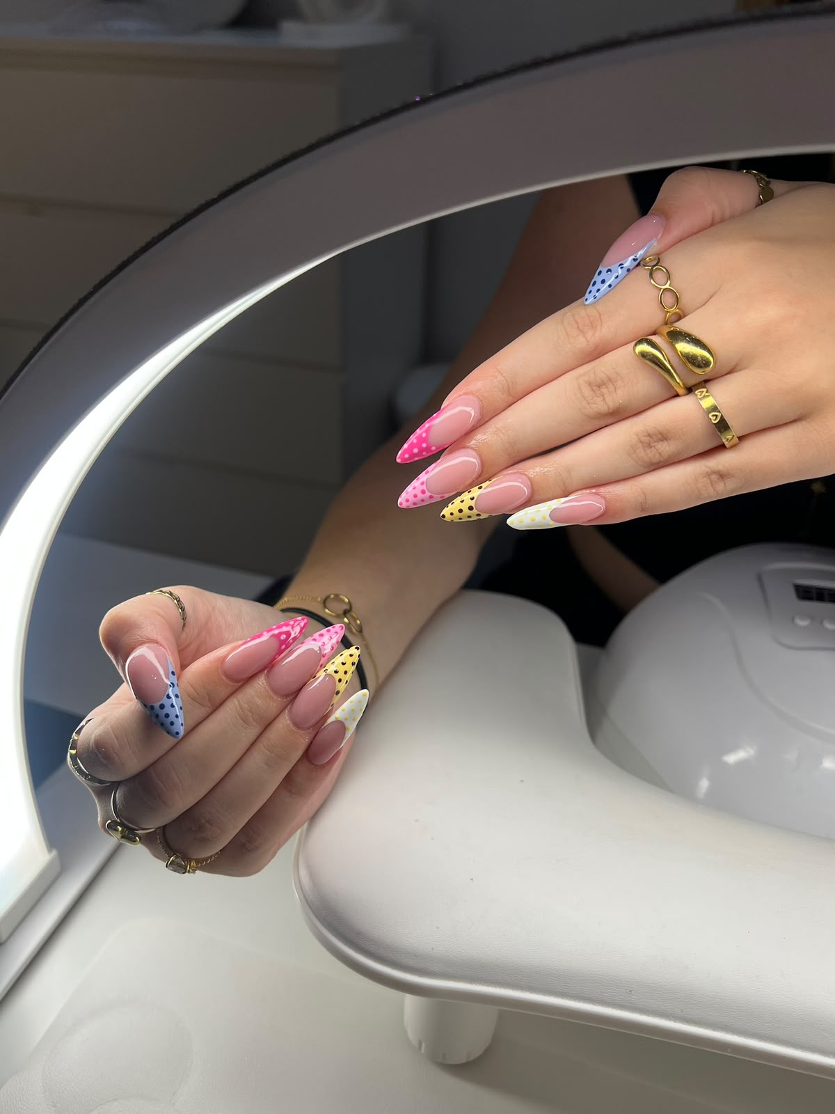 Detailed floral nail art in green and pink